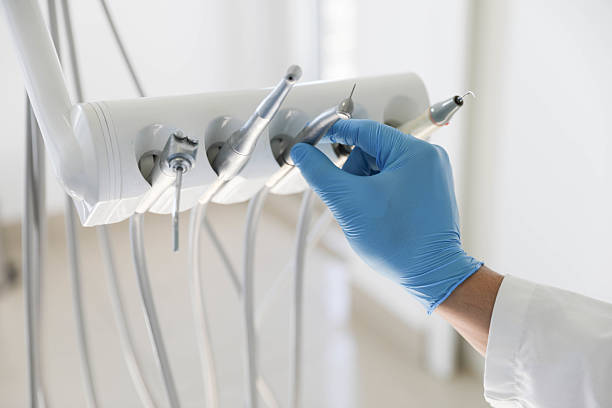 Professional Tooth Extraction technician working in Mathis, TX